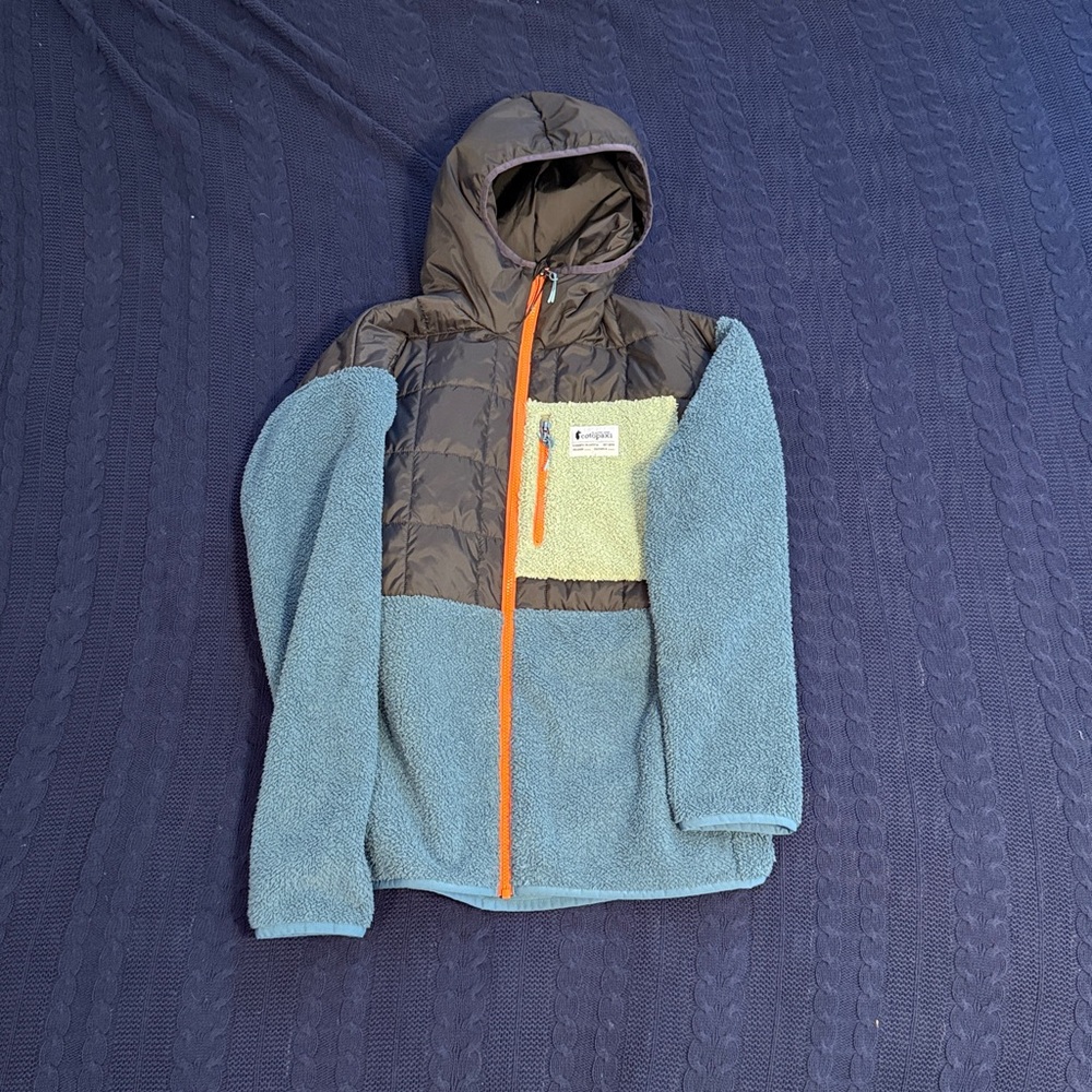 Cotopaxi Jacket with Orange Zipper and Teal Accents